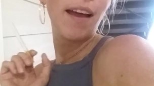 Dirty girl flashes perfect boobs smoking in apartment complex
