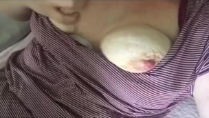 Horny female rubs tits 