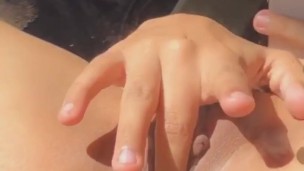 Sunkissed babe playing with tight Pussy. 