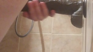 Sissy in chastity fucks huge dildos
