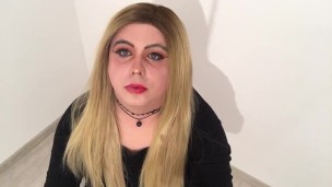 Blonde sissy smokes a cigarette and plays with cock in chastity