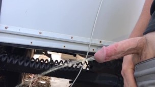 Half hard cock takes long piss 