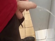 Hung lad at urinal next to me gets semi while pissing!