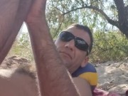 Relaxing in the shade on the beach. 2/16