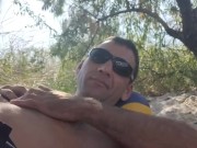 Relaxing in the shade on the beach. 3/16