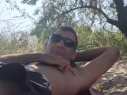 Relaxing in the shade on the beach. 5/16