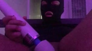 Moaning masked slut fucks herself until she cums