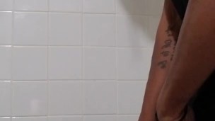 Big dicked dreadhead taking a piss