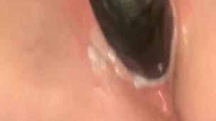 Creamy black dildo