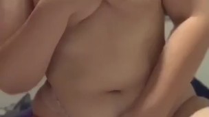 Teen plays with big tits