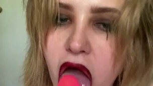 Goth slut sucks pink dick