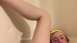 Teenager plays with dildo in the bath
