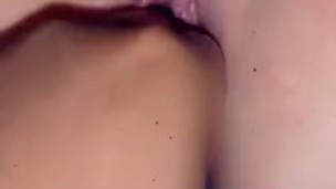 Playing with her pussy after creampie 