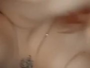 Sexy tatted girl rubbing tits and pussy