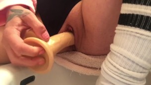 Amateur solo girl fucking her dildo in the bathroom
