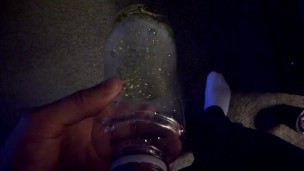 Pissing in a water bottle during a meeting