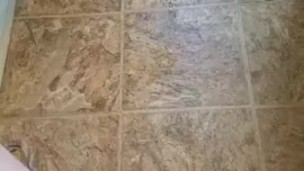 Power piss on bathroom wall