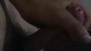 Masturbating