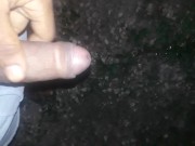 BBC pissing outdoors, stroking at end 