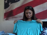 Deaf asian girl with glasses folds clothes. Will she burn herself on the jeans or find underwear? 10/16