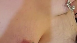 nonbinary babe plays with nipple clamps