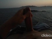 Skinny guy masturbates on a cliff during a sunset in Ibiza 16/16