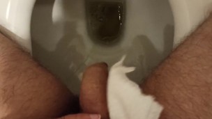 Pee. He wiped the urine drops with a napkin. He rolled off the wet shiny head. I dream that my wife 