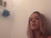 BLONDE FUCKS HERSELF IN THE SHOWER