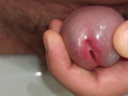 close up pissing and playing with peehole