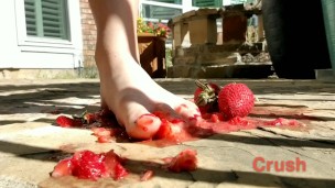 Sexy half Asian girl tramples fruit with her feet