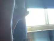 Wanking in front of my window 