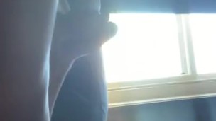 Wanking in front of my window 