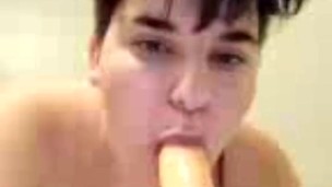 Sucking on dildo
