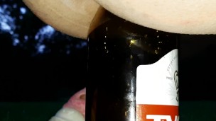 pissing and fucking a bottle in the park