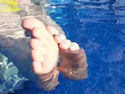 MILF Mistress Vixie's Soles And Toes In The Pool.