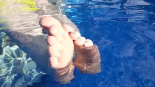 MILF Mistress Vixie's Soles And Toes In The Pool.
