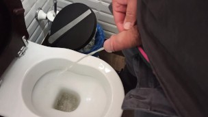 Peeing in a public toilet
