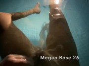 Lesbian couple playing in the pool on vacation 12/16