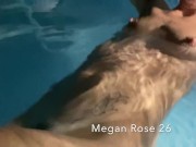 Lesbian couple playing in the pool on vacation 6/16