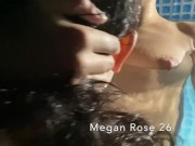 Lesbian couple playing in the pool on vacation 9/16