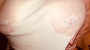 White girl plays with big wet natural boobs