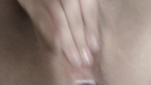 Slut plays with dildo