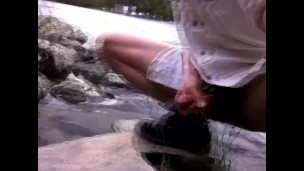 Boy scout in short shorts wanks his twink dick outdoors in the forest and cums on the rocks