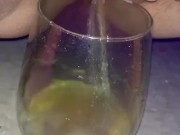 Pissing in a wine glass
