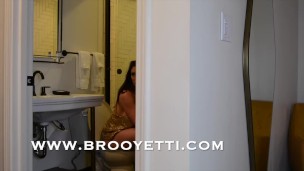 Girl Peeing in Toilet