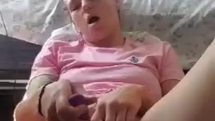 Milf plays with her pussy 