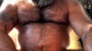 BULL BEAST STROKING MASSIVE COCK WHILE ENJOYING HIS FAT CIGAR