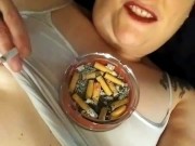 Pierced Kitty is chain smoking in bed with wine and a hookah 13/16