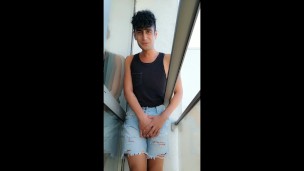 Pee desperation and wetting short jeans after I am locked out on a balcony