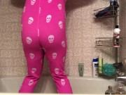Peeing her pajamas 